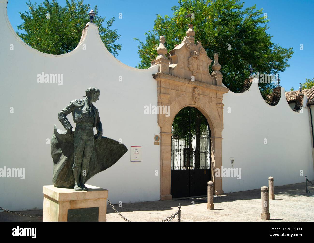 Spain, Ronda The historic bull ring A statue of a Matador Elegant sculpture  by this monument to Spanish culture Stock Photo