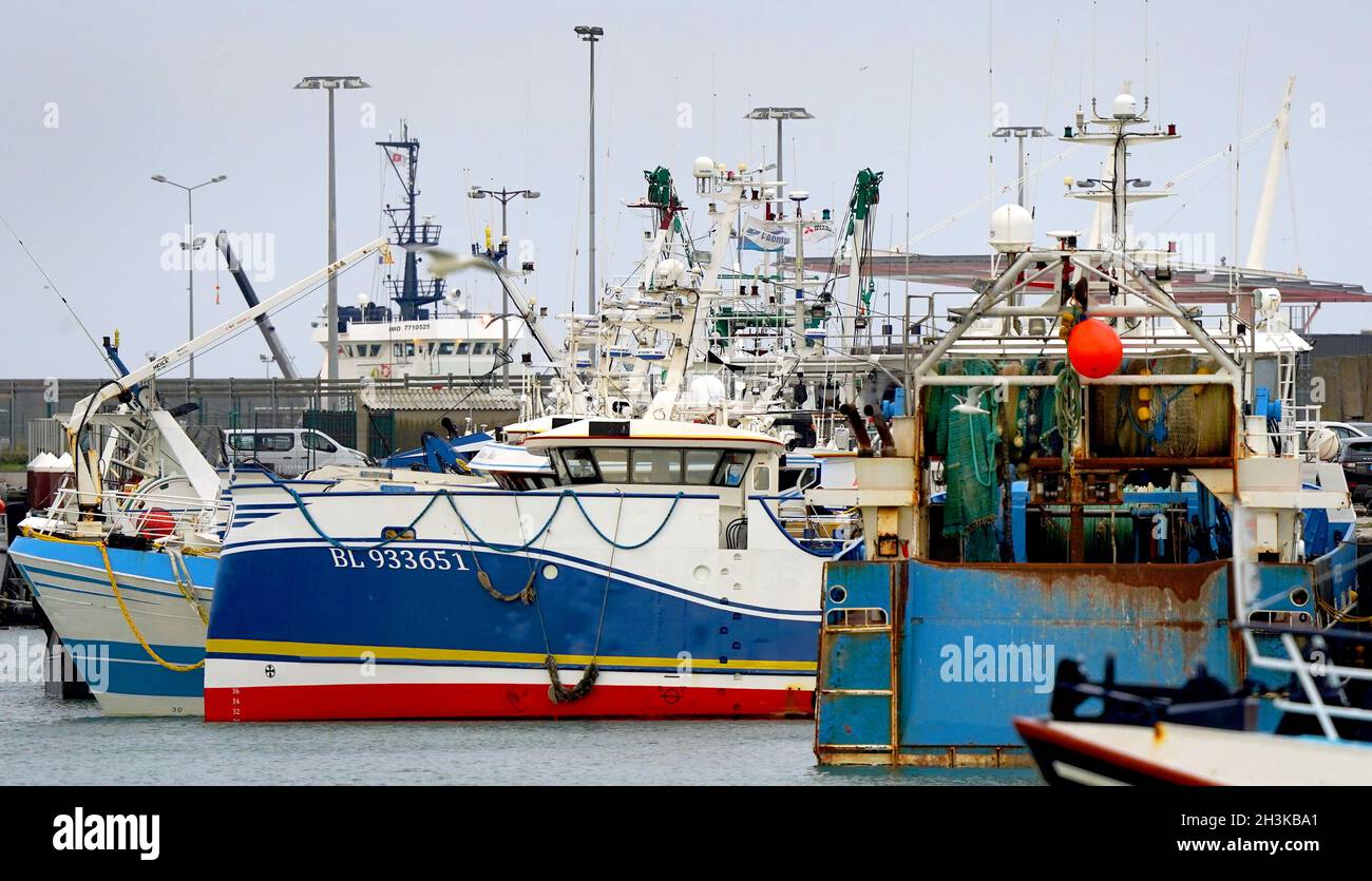 Fishing boats moored in the port of Boulogne, France. Environment Secretary George Eustice has warned France the UK could retaliate if it goes ahead with threats in the fishing row, warning that 'two can play at that game'. Picture date: Friday October 29, 2021. Stock Photo