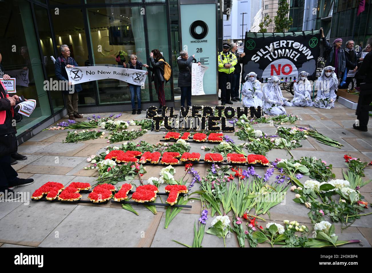 London UK. 2021-10-29, Protest Macquarie Capital a major investor in the #SilvertownTunnel project to demand it withdraws support for this climate-busting mega-highway. Credit: Picture Capital/Alamy Live News Stock Photo