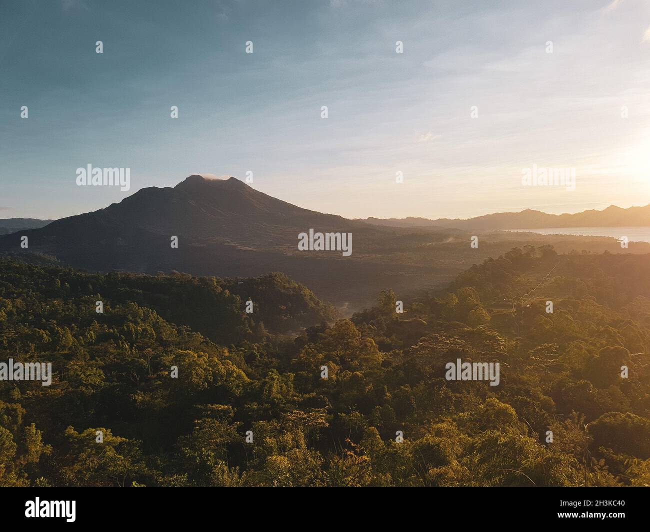 Batur volcano during beautiful sunrise in Bali Stock Photo - Alamy