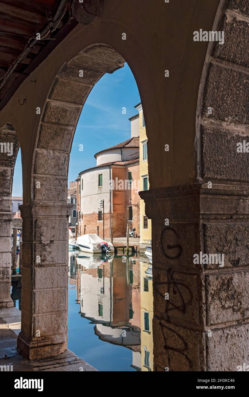 Canal Vena seen throuh arcade of Palazzo Grassi, Chioggia, Venice ...