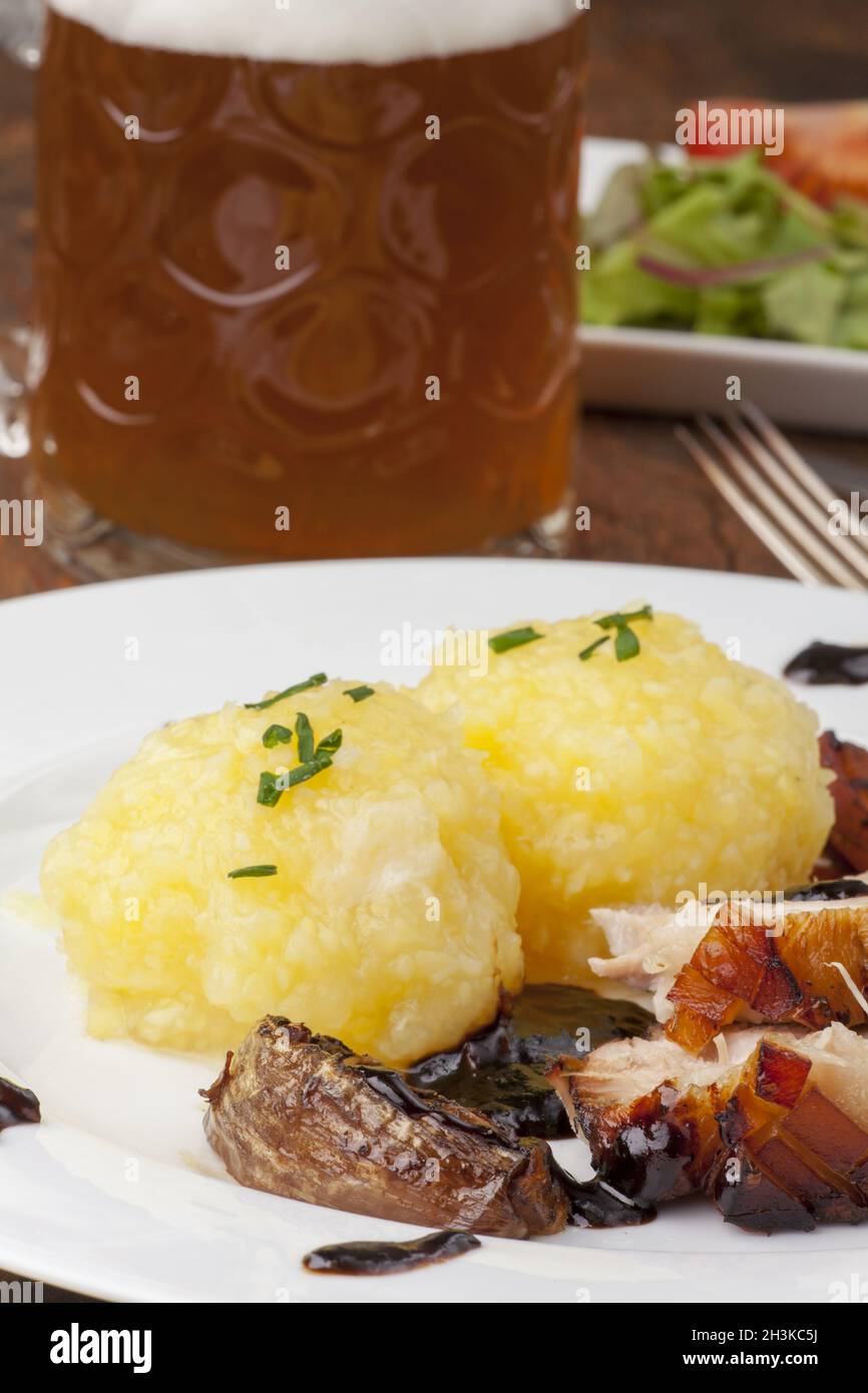 Bavarian roast pork with beer and dumplings Stock Photo