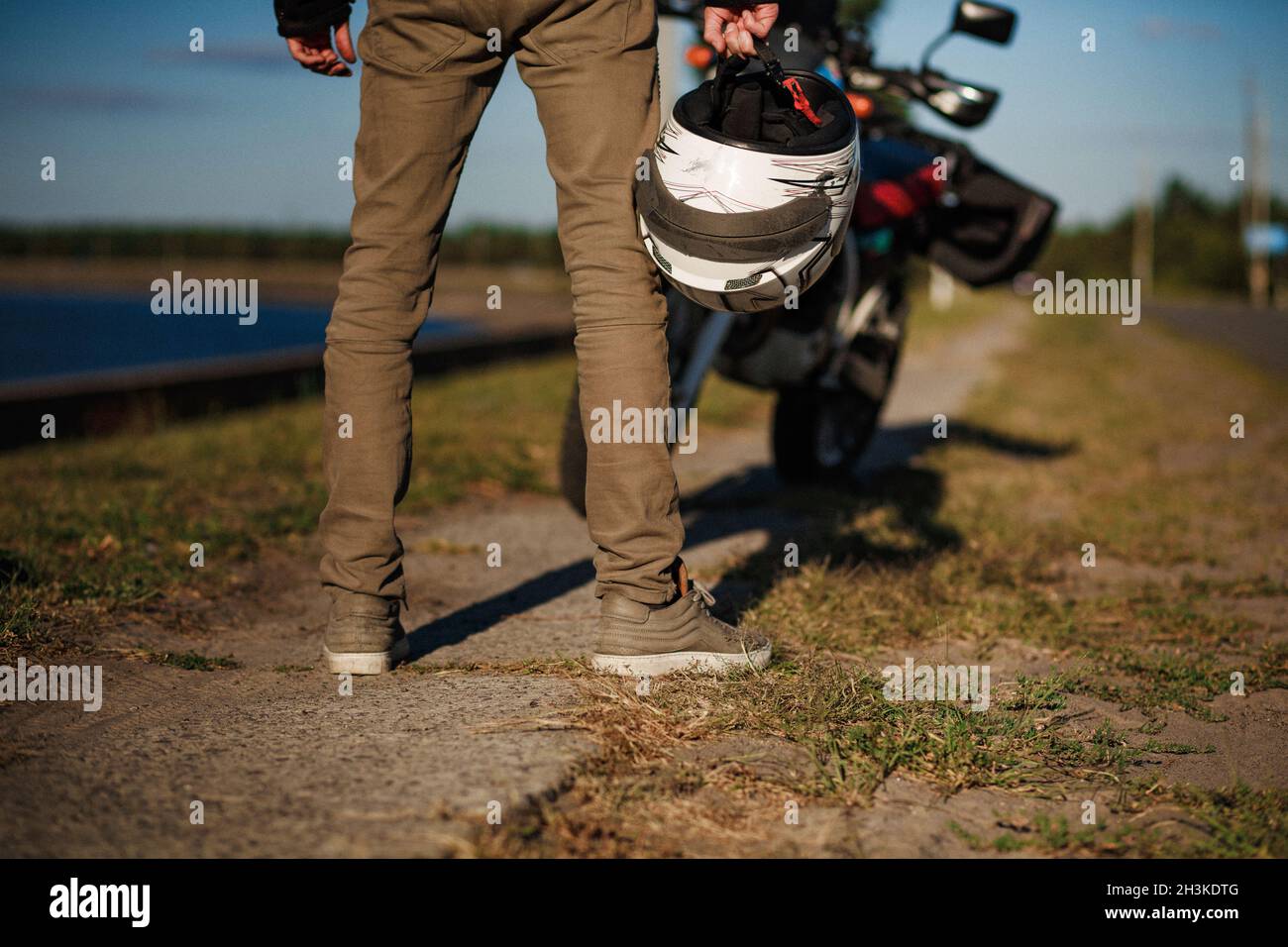 Close view on biker's legs from the back Stock Photo
