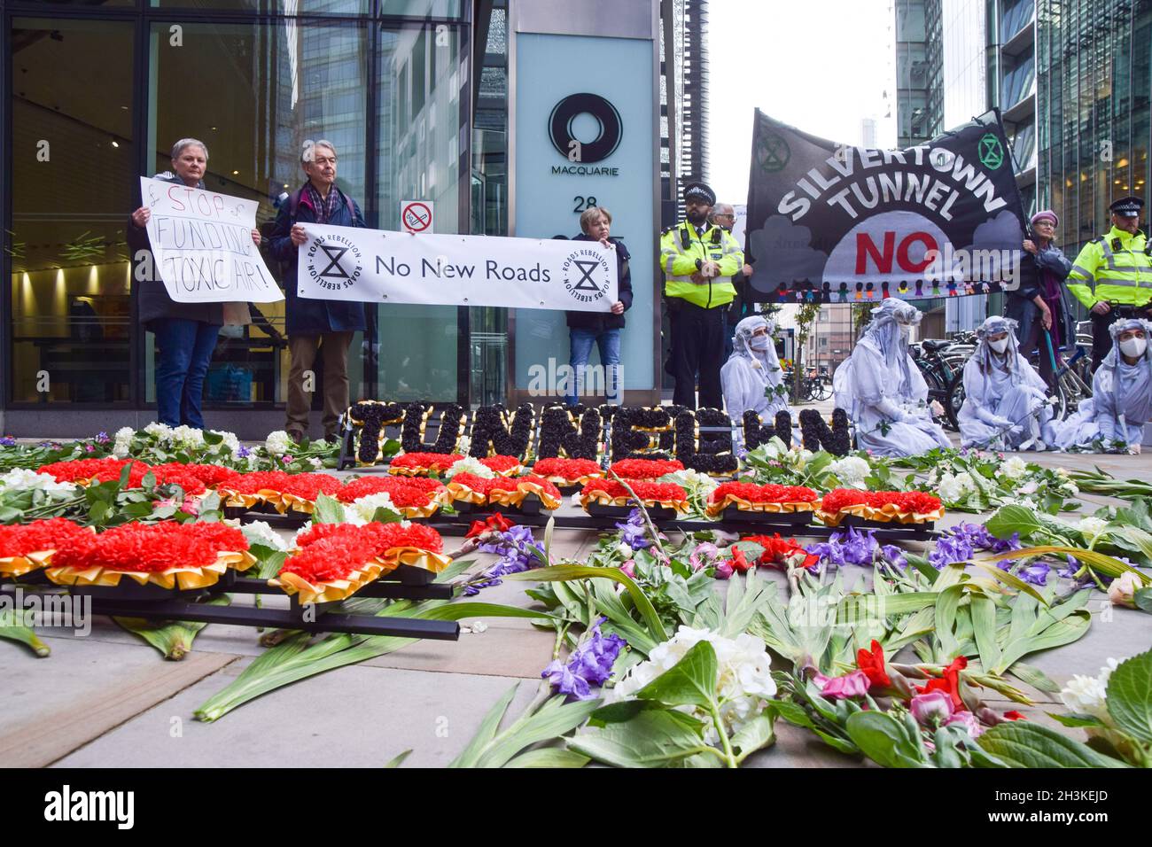 London, UK. 29th Oct, 2021. Extinction Rebellion activists gathered outside the offices of the Macquarie Group in the City of London in protest against the Silvertown Tunnel Credit: Vuk Valcic/Alamy Live News Stock Photo