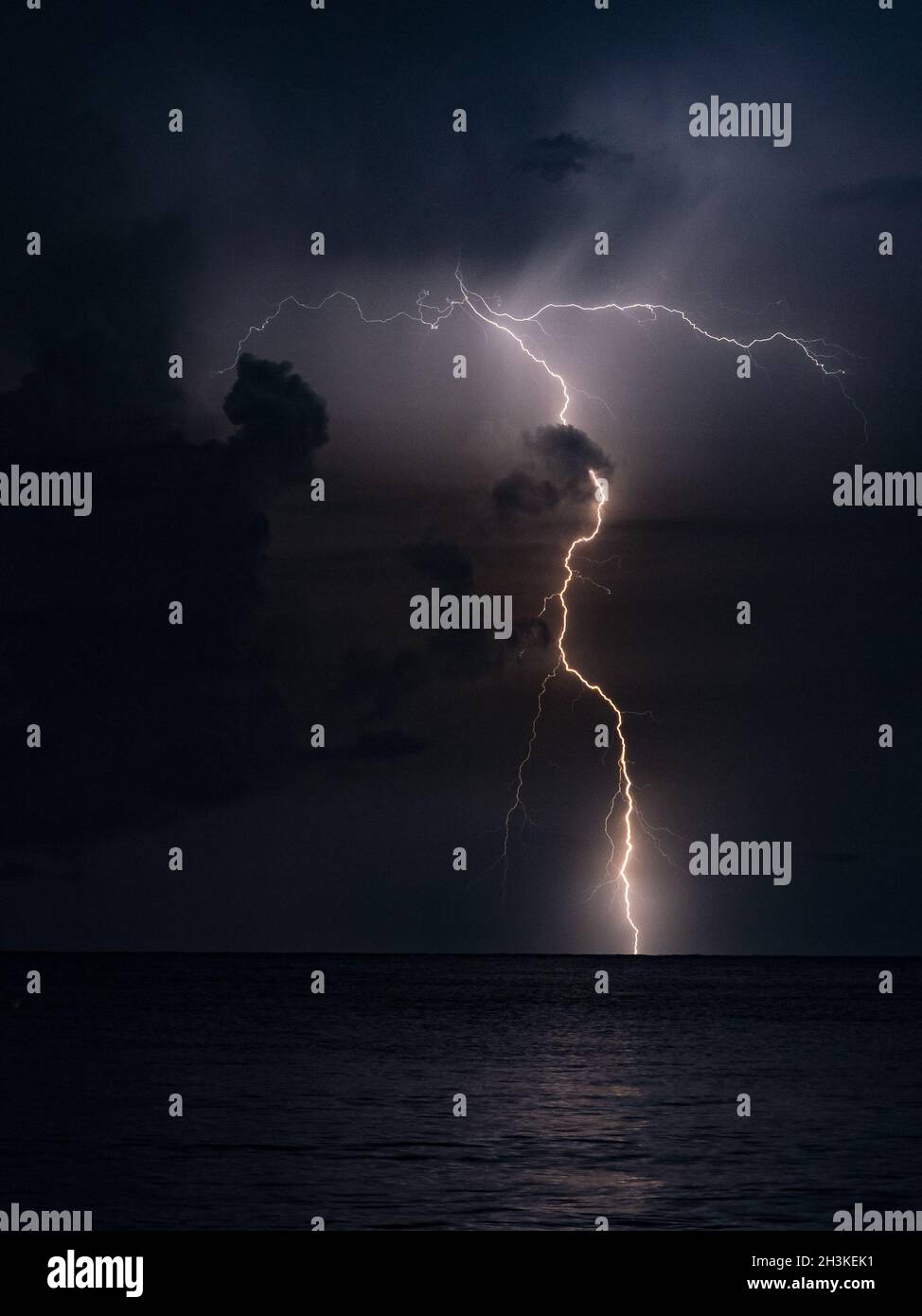 Beautiful scenery of the lightning over a lake, Miramar Beach, Florida Stock Photo