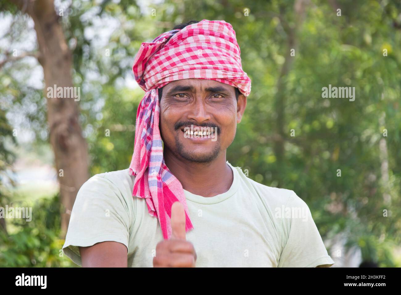 portrait of indian farmer standing in agriculture field Stock Photo - Alamy