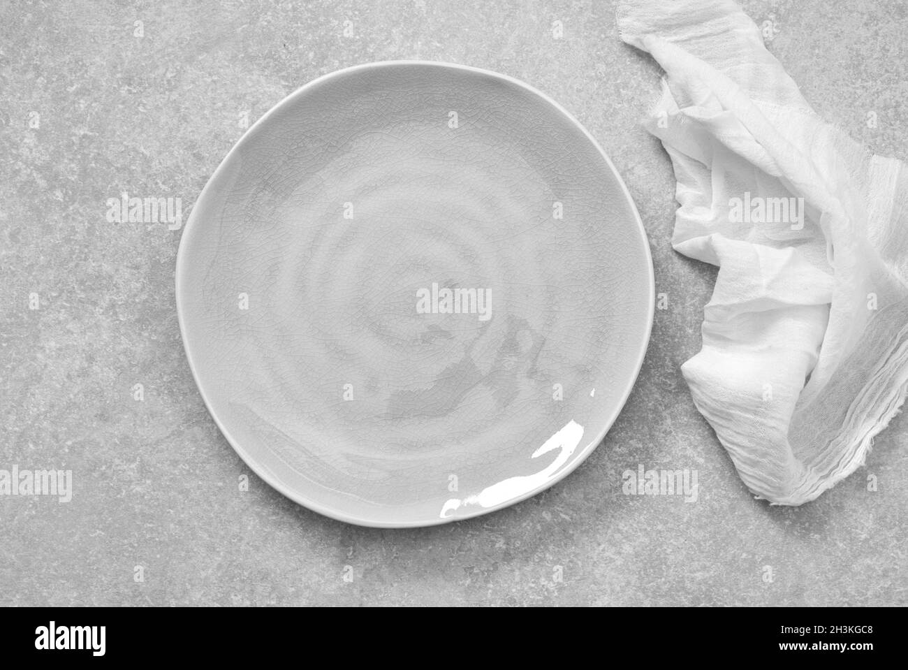 White empty plate on table Stock Photo