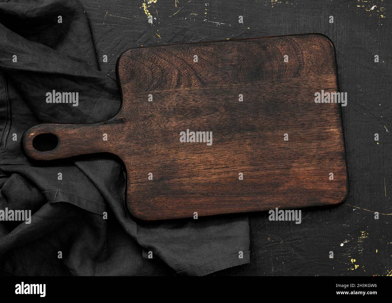 Empty cutting board on a wooden table Stock Photo