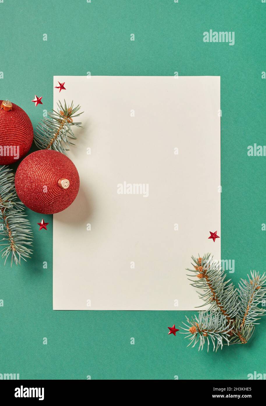 Christmas balls and blank paper Stock Photo