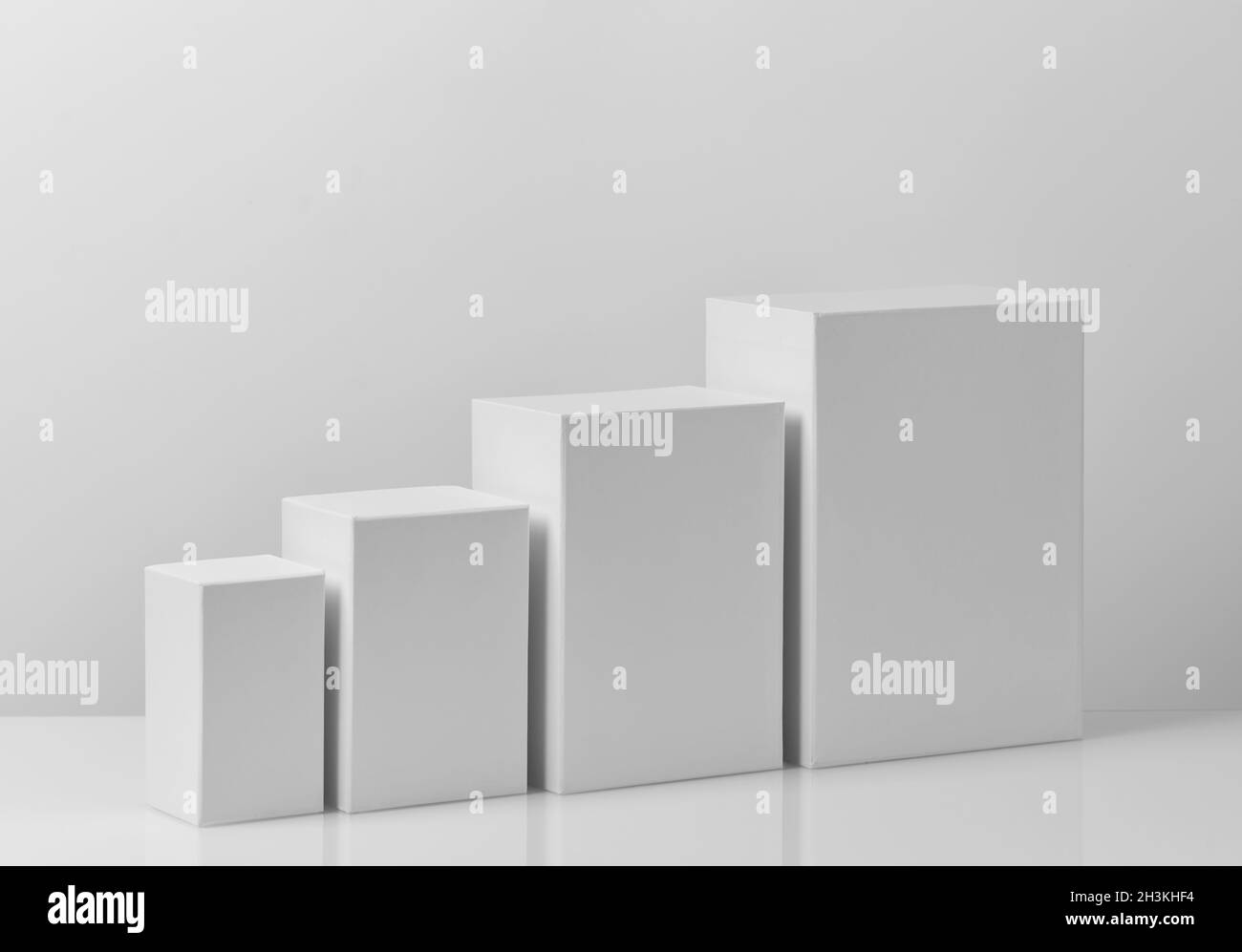 Different sizes white boxes Stock Photo