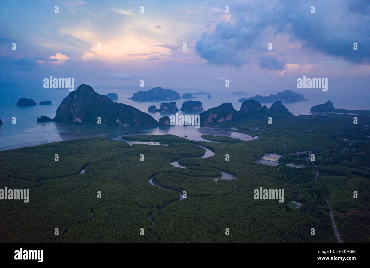 Aerial view of scenic tropical bay during beautiful sunset Stock Photo ...
