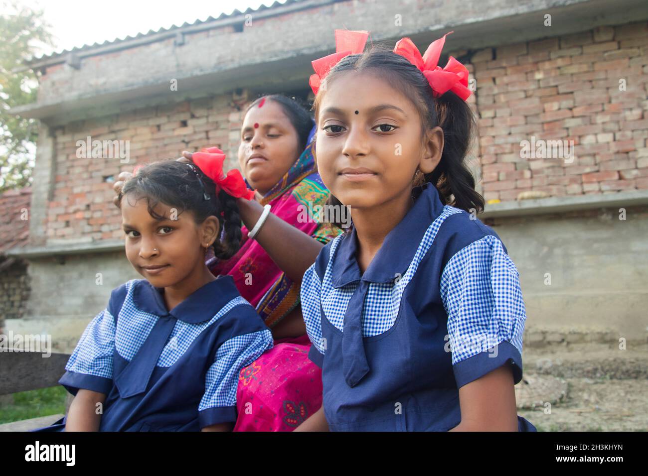 Indian school girls reading book hi-res stock photography and images ...
