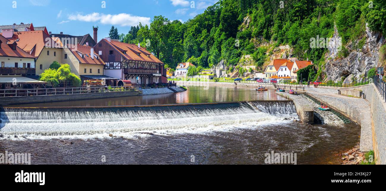dam U Jeleni lavky - weir on the Vltava River with boaters in boats going down the river, Cesky Krumlov, Czech republic Stock Photo