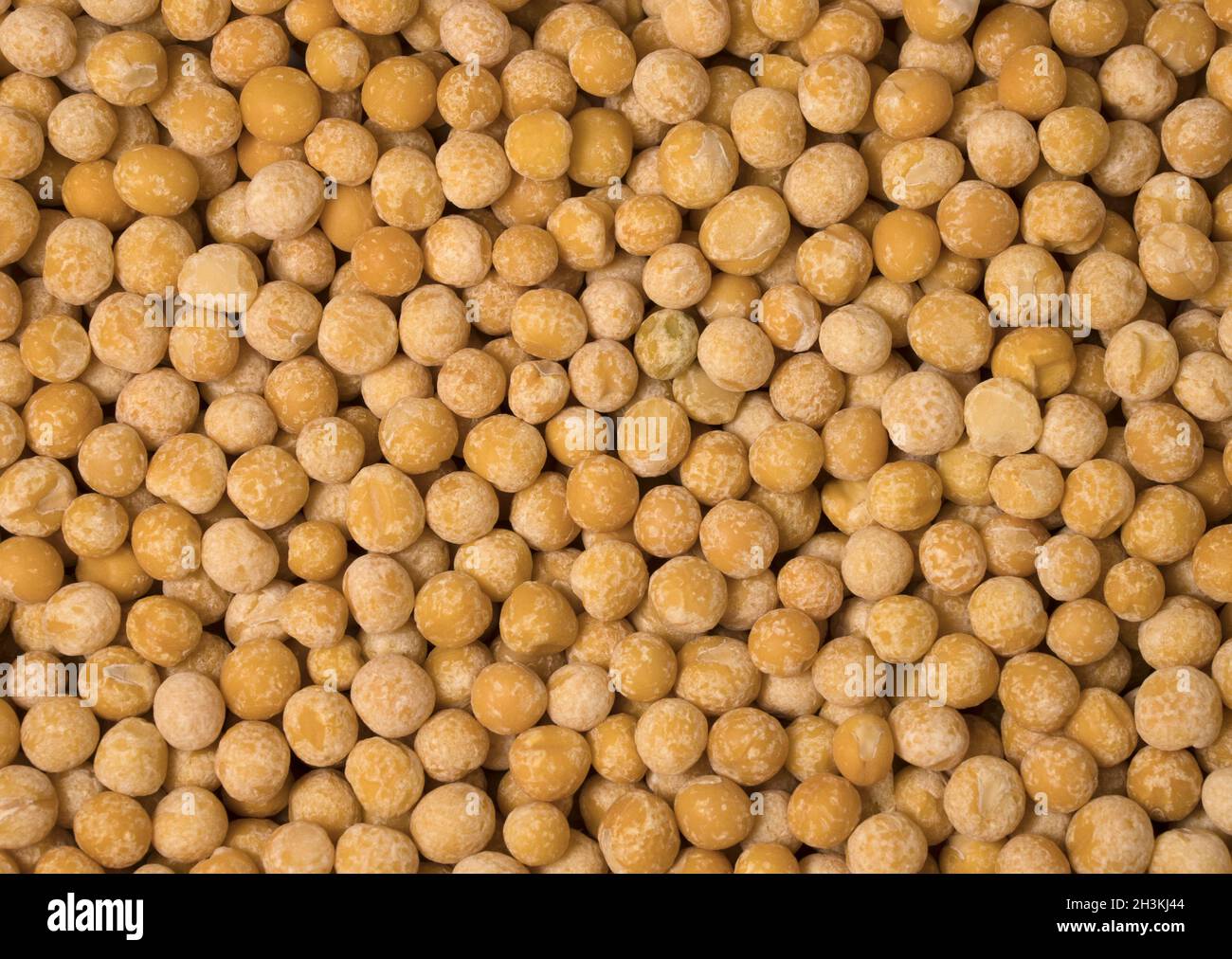 Yellow dry peas as background, close up view. Stock Photo