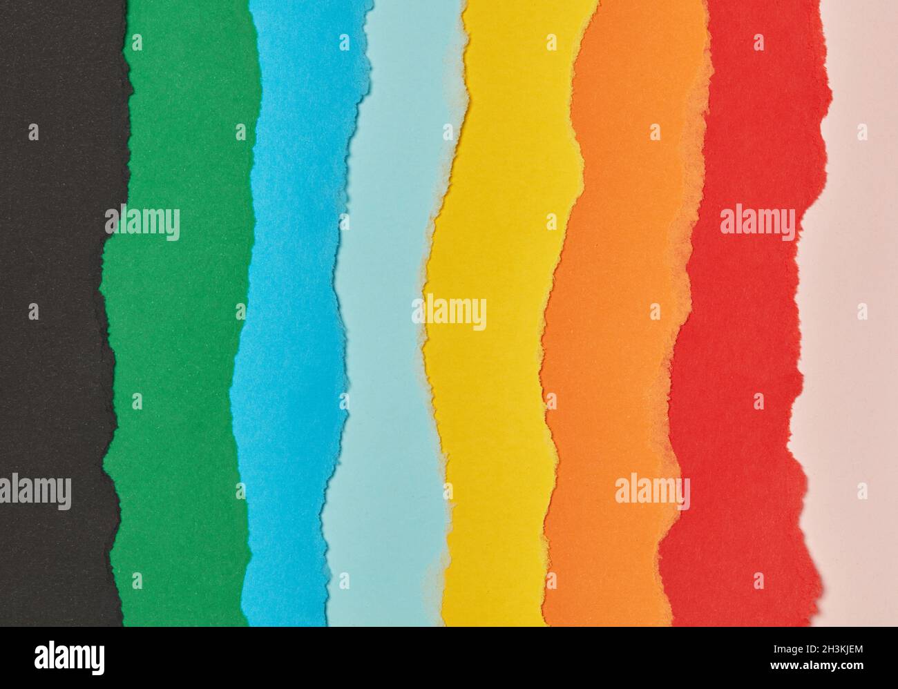 Multi-colored torn paper background Stock Photo - Alamy