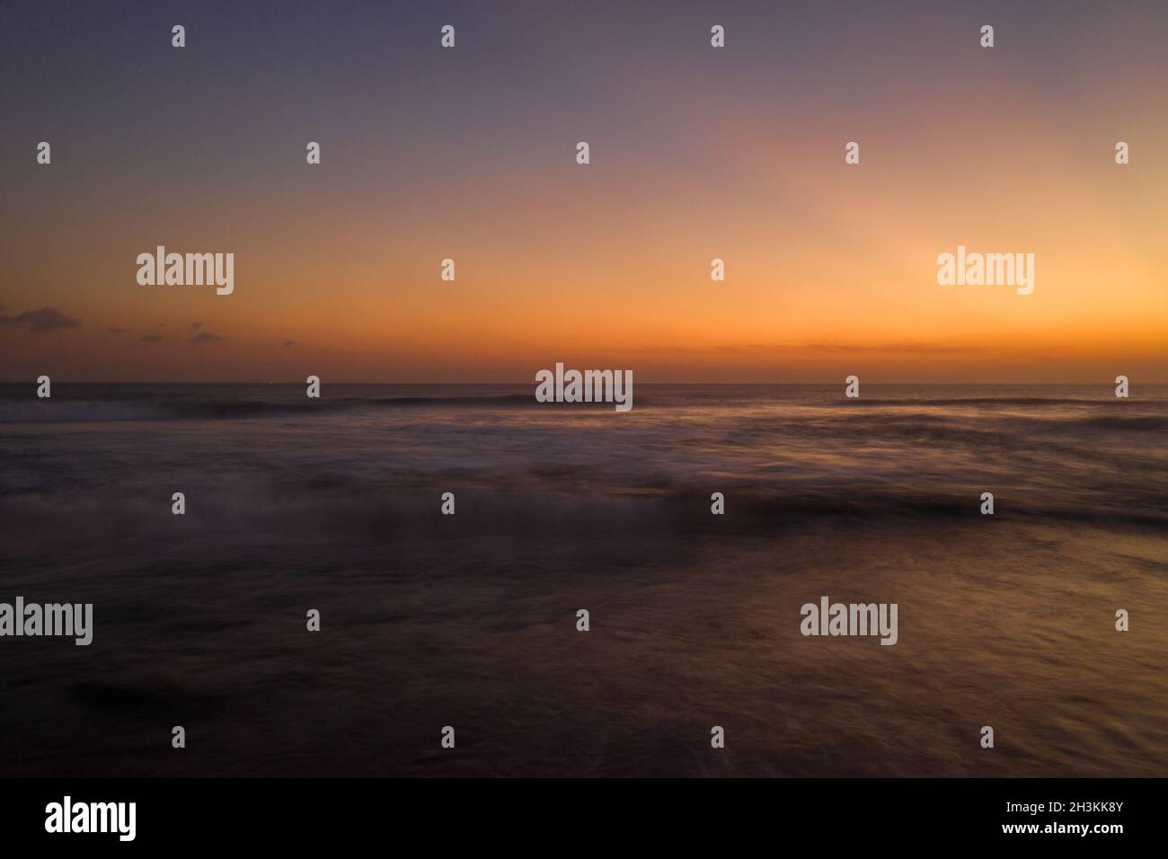Aerial view of the sea over beautiful golden sunset sky Stock Photo - Alamy
