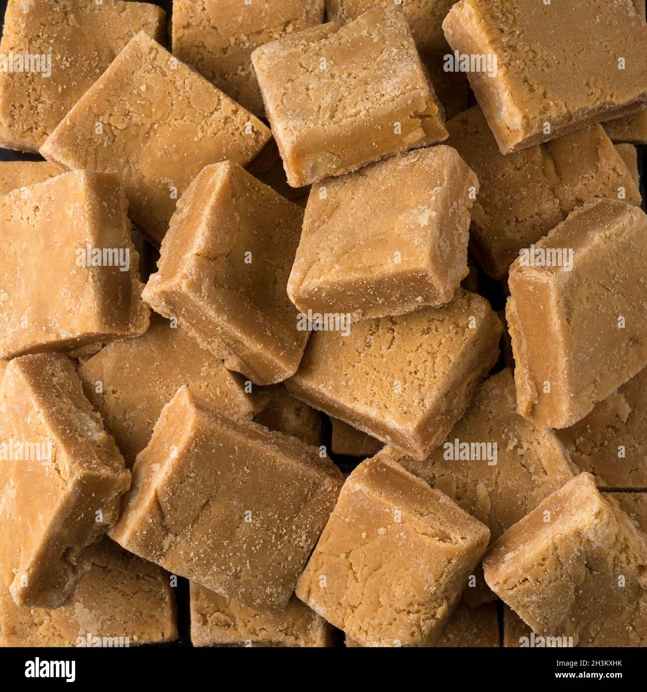 caramelized milk toffee, candy pieces, closeup view taken from above of
