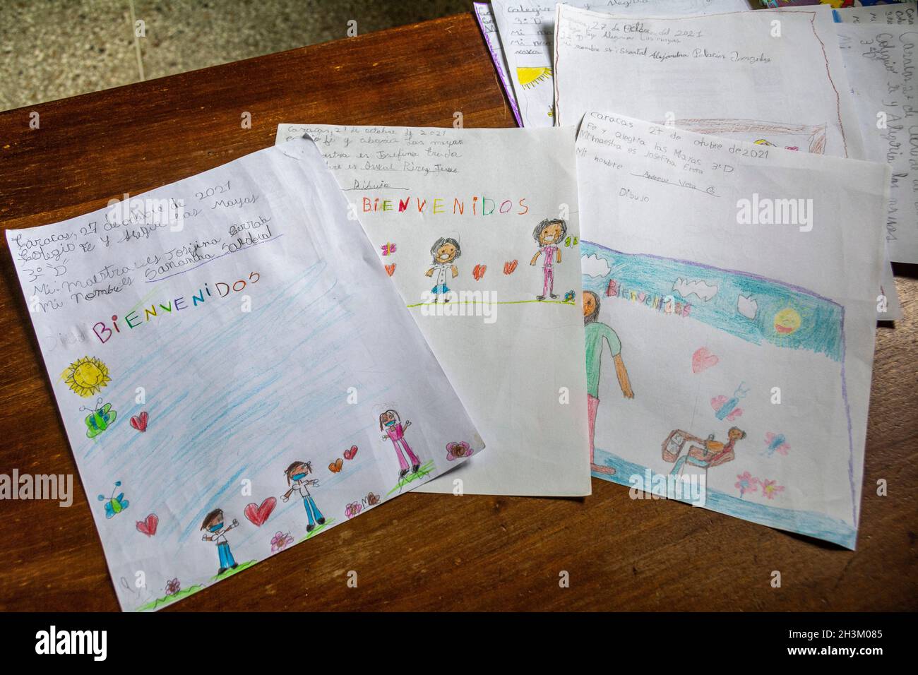 Drawings of children, writing Welcome back to school. Return to classes in primary and high schools since the beginning of the pandemic, March 2020. C Stock Photo