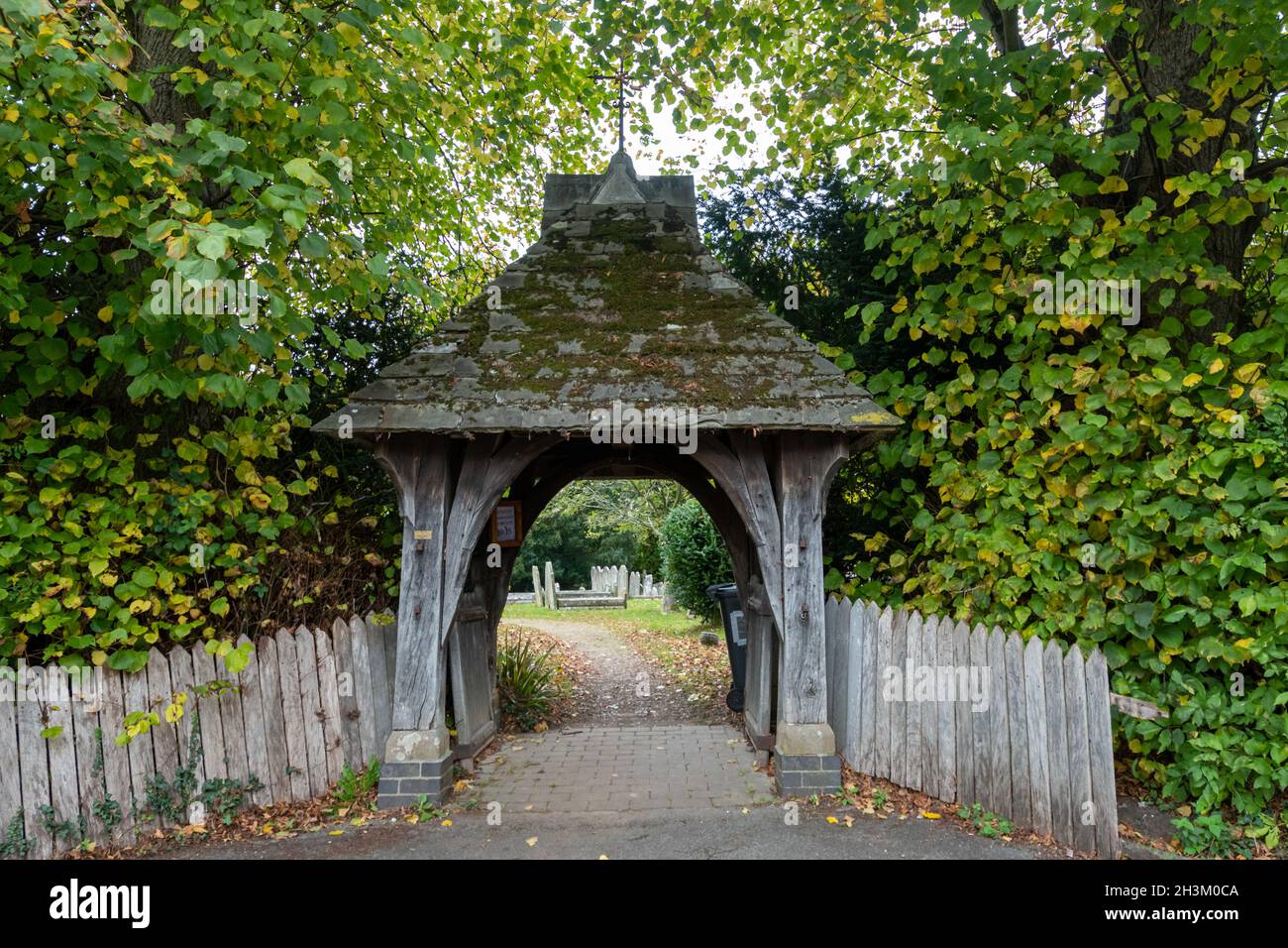 Lychgate (lych gate) entrance to St Andrew's Church in Sherborne St John, a village church in Hampshire, England, UK Stock Photo