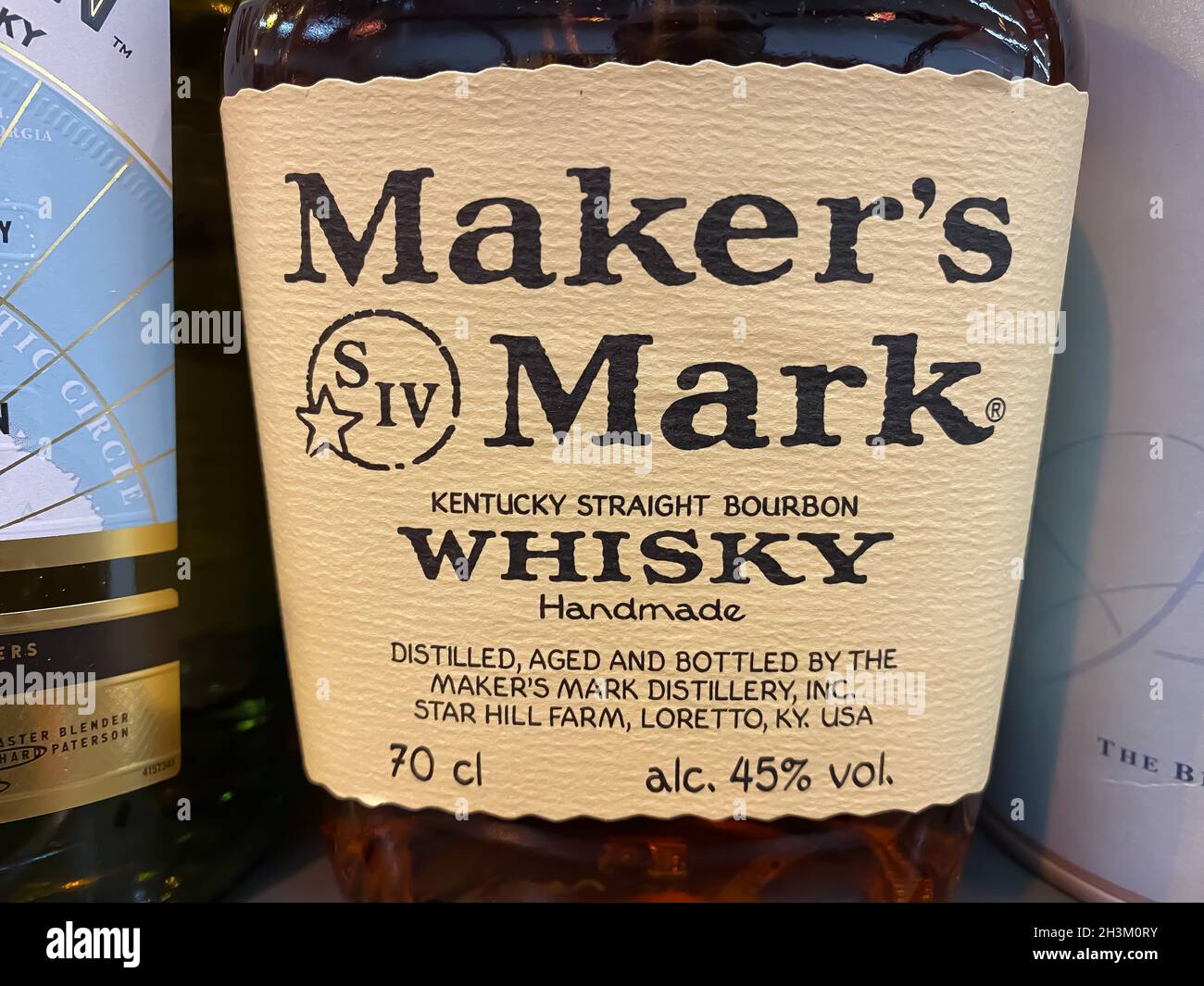 Viersen, Germany - June 9. 2021: View on bottle label with logo lettering of makers mark whisky  in shelf of german supermarket Stock Photo