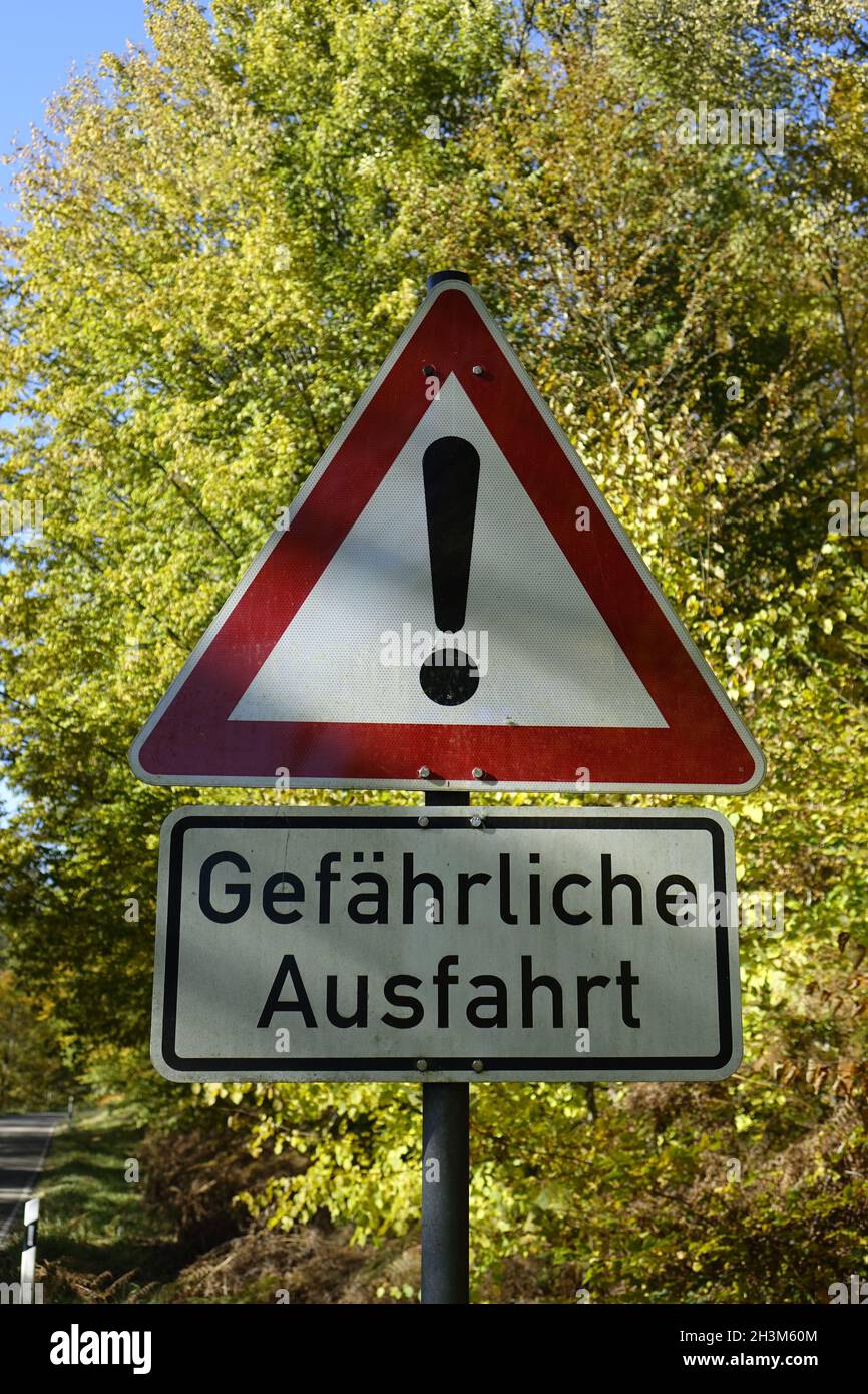 German traffic warning sign 'Gefährliche Ausfahrt' (dangerous exit) Stock Photo