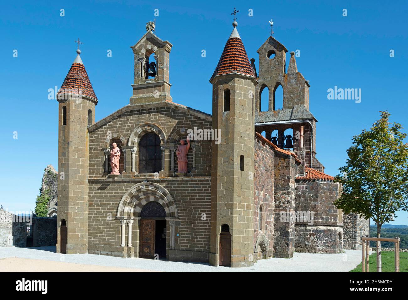 Solignac sur Loire, Saint Vincent church and his typical bell tower, Haute Loire department, Auvergne Rhone Alpes, France Stock Photo