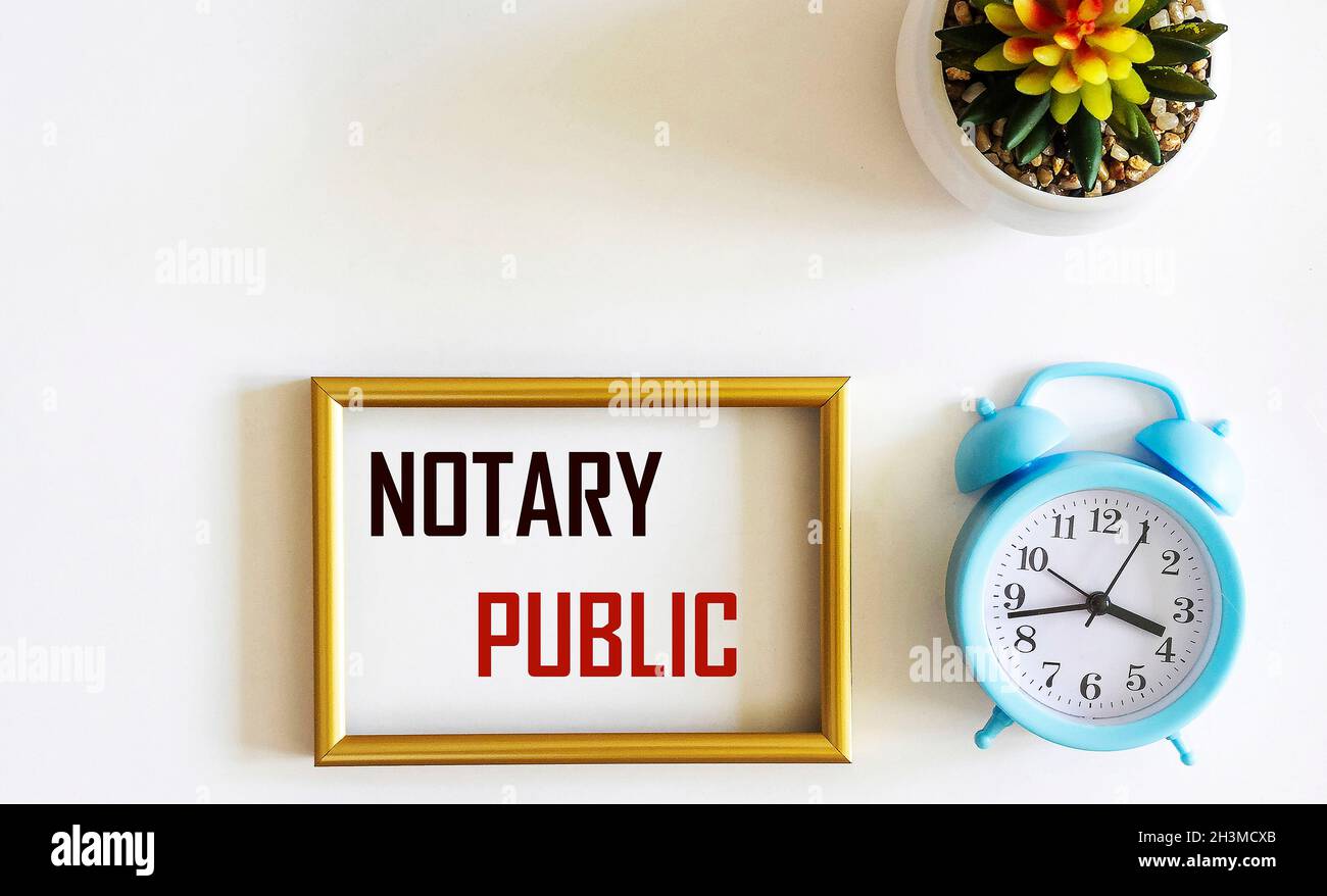 The text NOTARY PUBLIC is written on a photo frame and a white background. Concept meaning