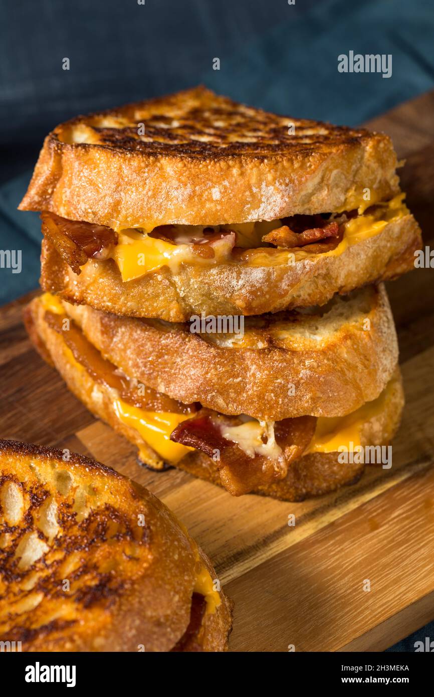 Homemade Bacon Grilled Cheese with Cheddar and Provolone Stock Photo