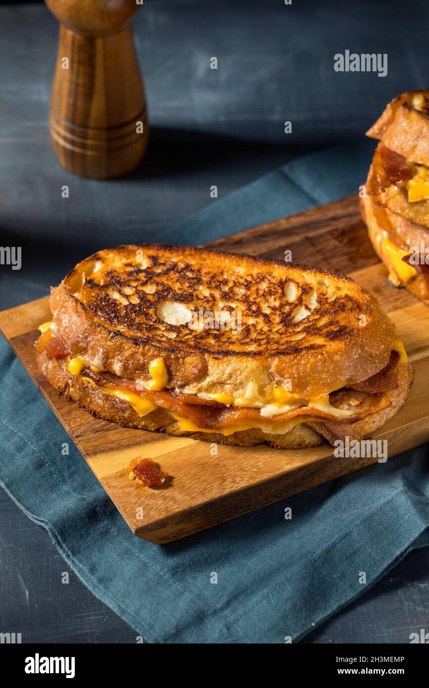 Homemade Bacon Grilled Cheese with Cheddar and Provolone Stock Photo