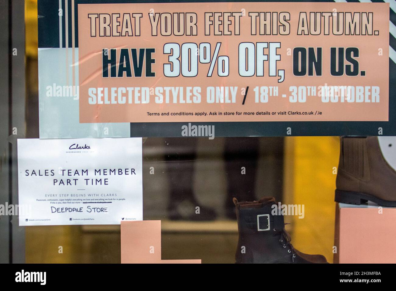 Clarks shoe shop Advertising for Recruitment, hiring sales staff, shop  vacancies in Preston city centre, UK Stock Photo - Alamy