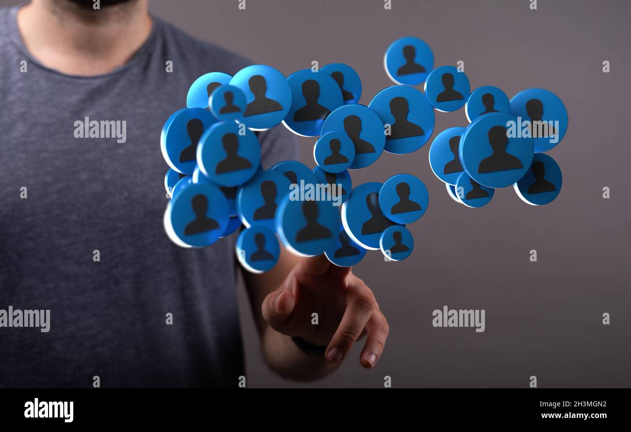3D rendering of floating group of blue people icons on a businessman's ...
