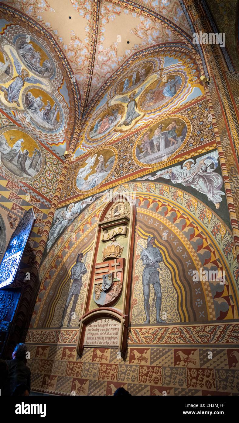 Entrance Veestibule of the Mathias Church: Murals and geometric patterns completly cover and decorate the walls of this entrance to the famous Mathias Church in Buda. Stock Photo