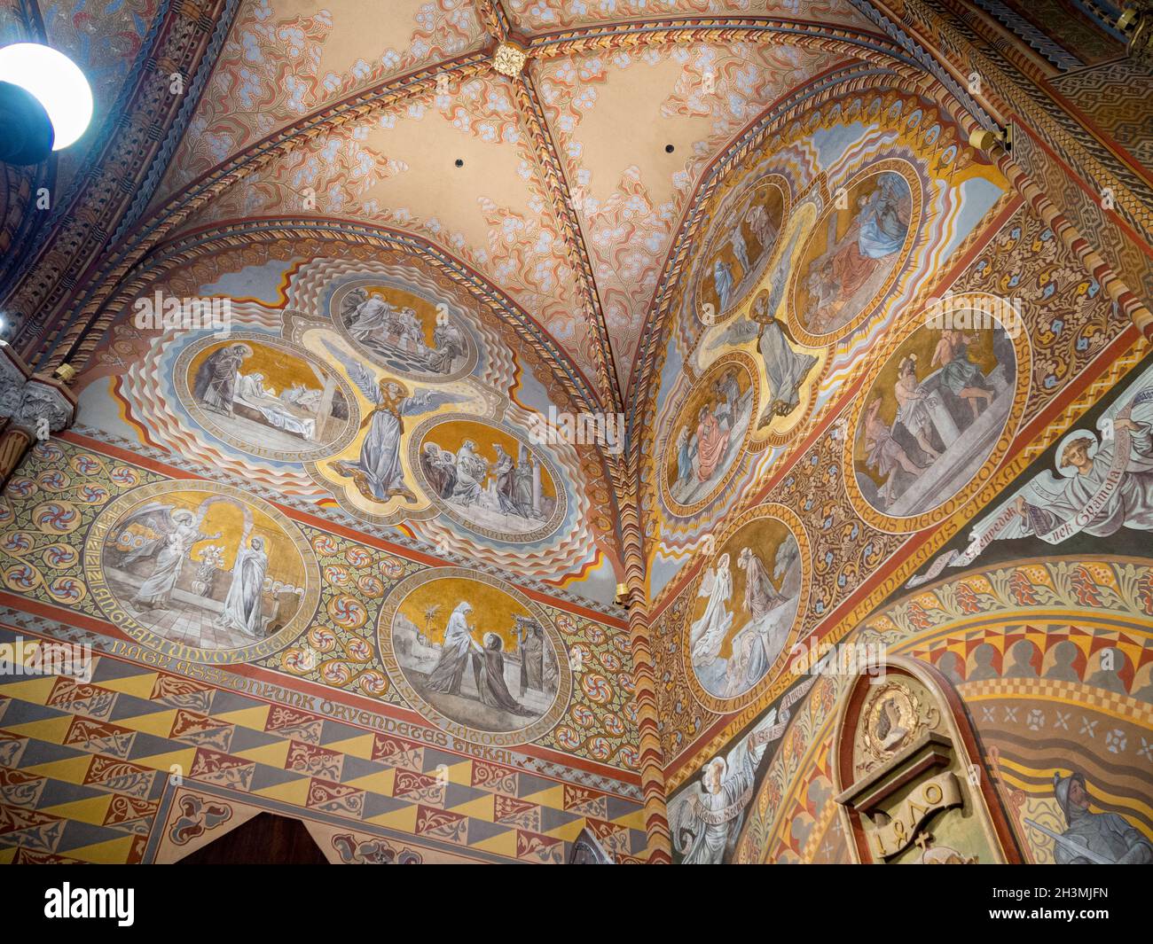 Ceiling at the entrance Veestibule of the Mathias Church: Murals and geometric patterns completly cover and decorate the walls of this entrance to the famous Mathias Church in Buda. Stock Photo