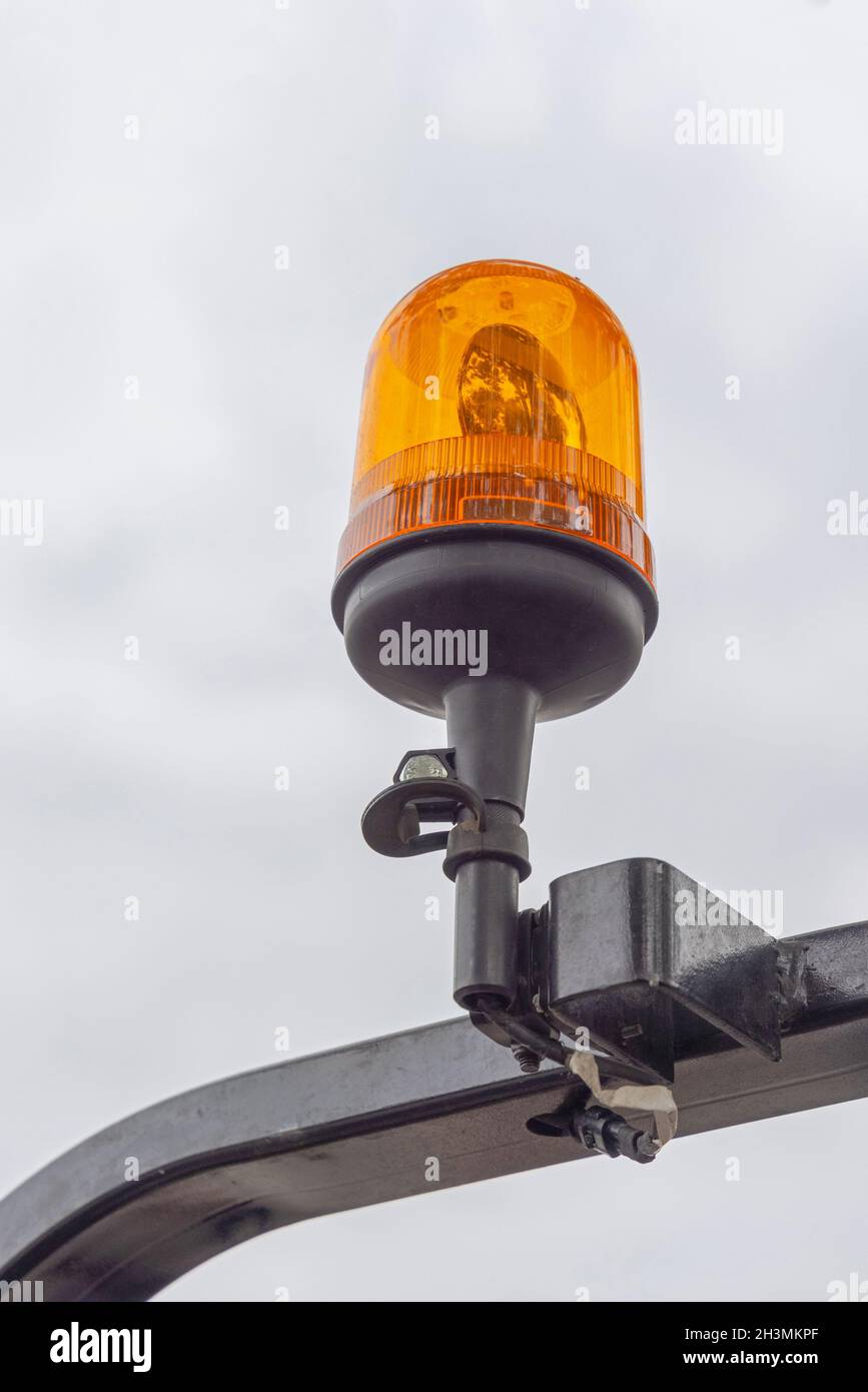 Amber Rotating Light Dome at Top of Machine Bar Stock Photo - Alamy