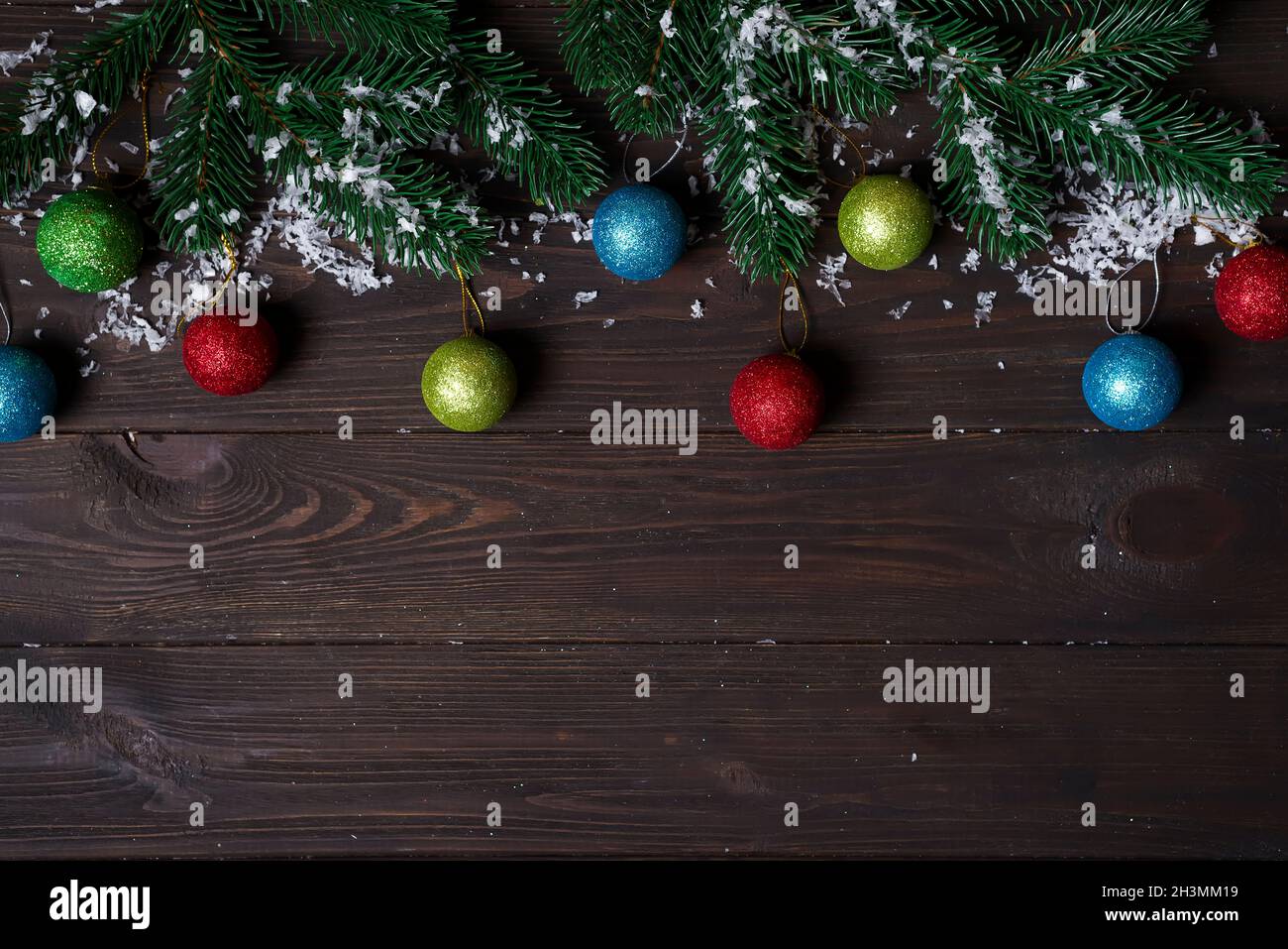 Christmas wooden background with snow fir tree Stock Photo - Alamy
