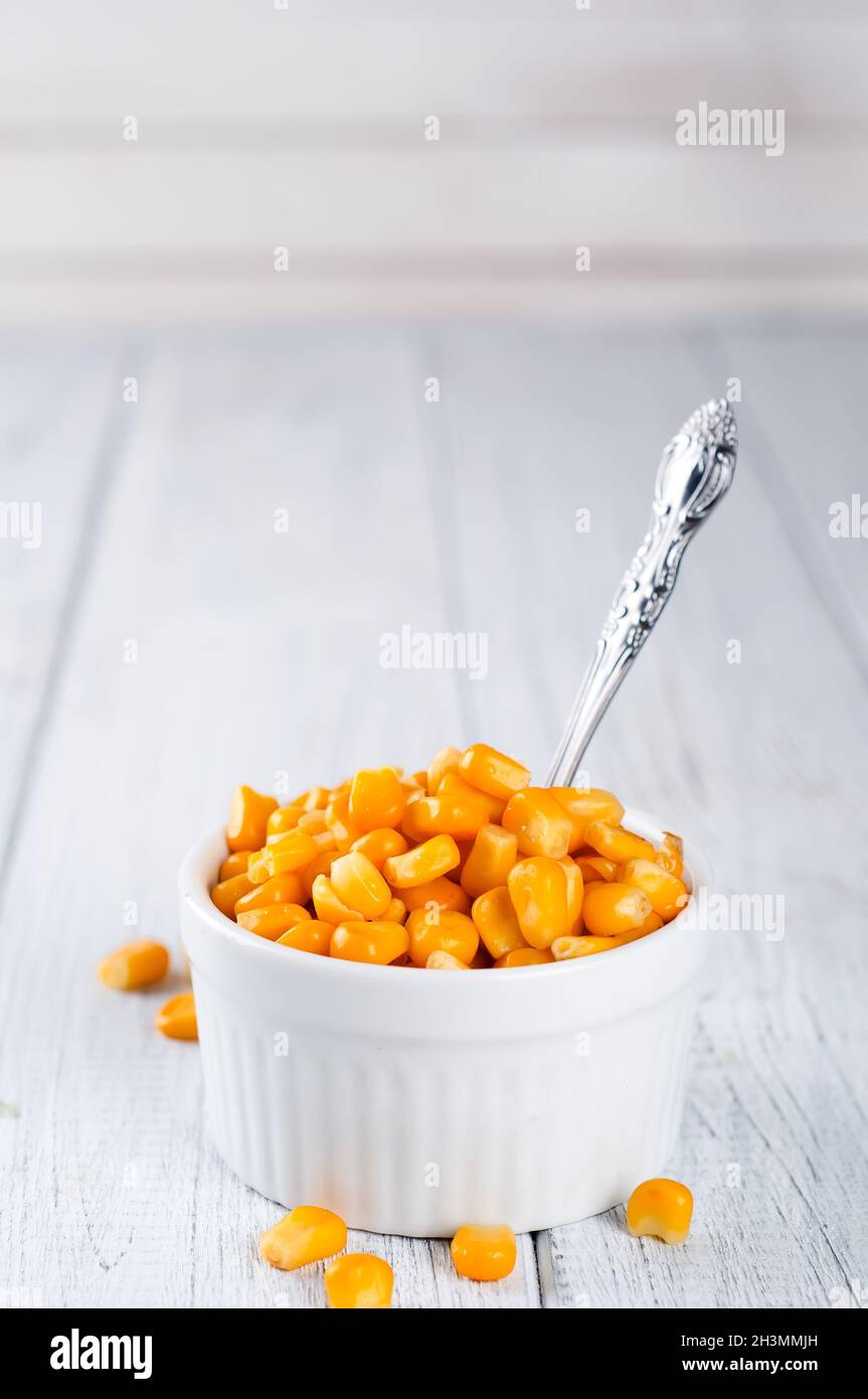 Boiled corn kernels in white cups Stock Photo Alamy