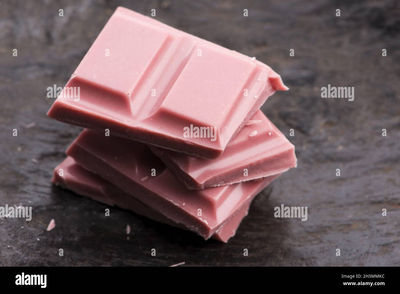 Trendy, New Type Ruby Chocolate Sliced Stock Photo - Alamy