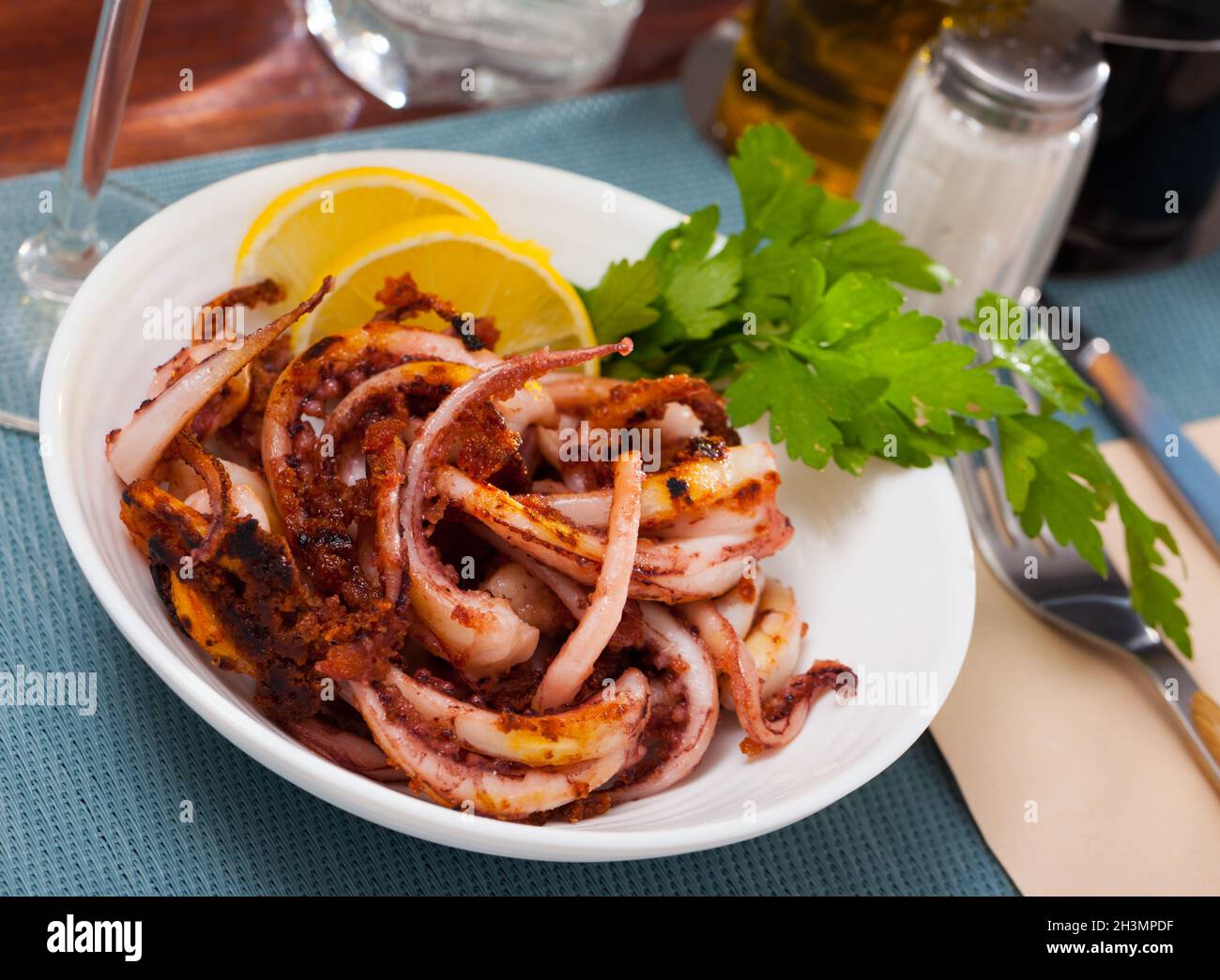Fried tentacles squid Stock Photo - Alamy