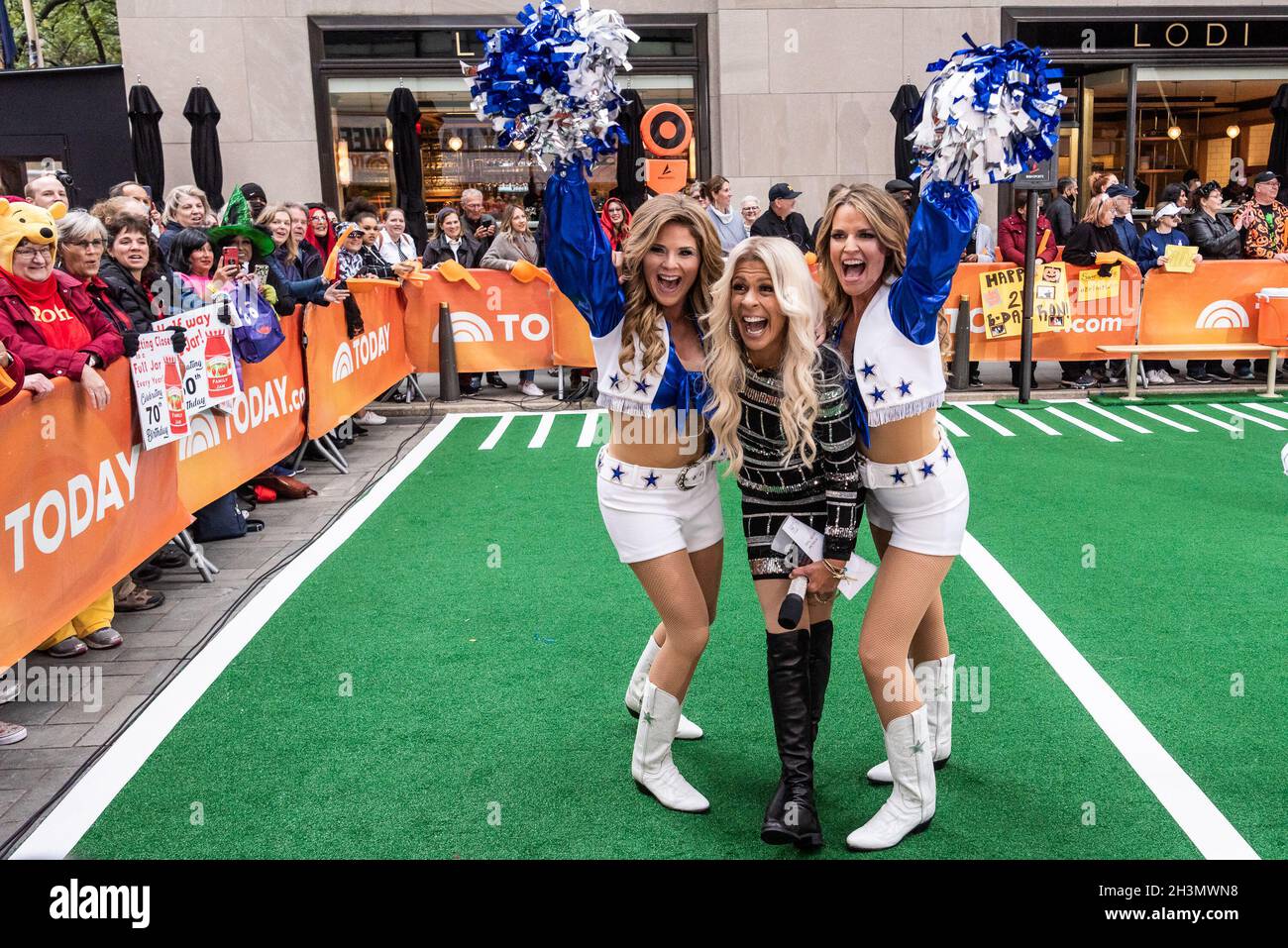 New York, USA. 29th Oct, 2021. Hoda Kotb (m) dressed as Carrie Underwood and Savannah Guthrie and Jenna Bush Hager as Dallas Cowboys Cheerleaders, celebrate Halloween with Football' Fright' at NBC's 30 Rock in New York, New York, on Oct. 29, 2021. (Photo by Gabriele Holtermann/Sipa USA) Credit: Sipa USA/Alamy Live News Stock Photo