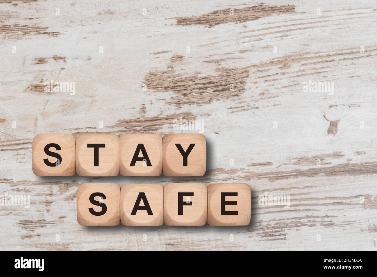Stay safe written on wooden cubes Stock Photo