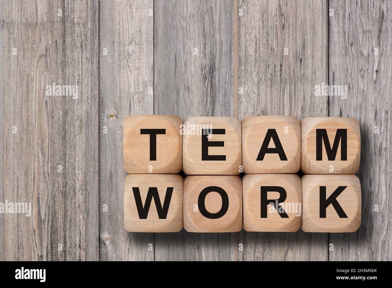 Team work printed on wooden cubes Stock Photo