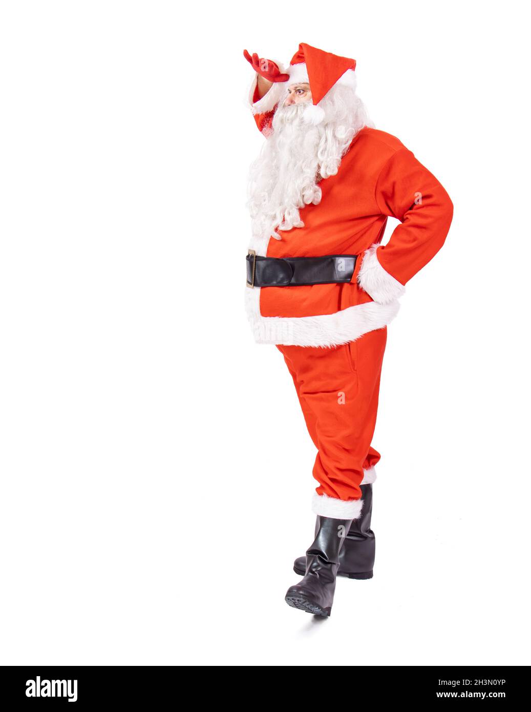Santa Claus looking into the distance, isolated on a white background Stock Photo