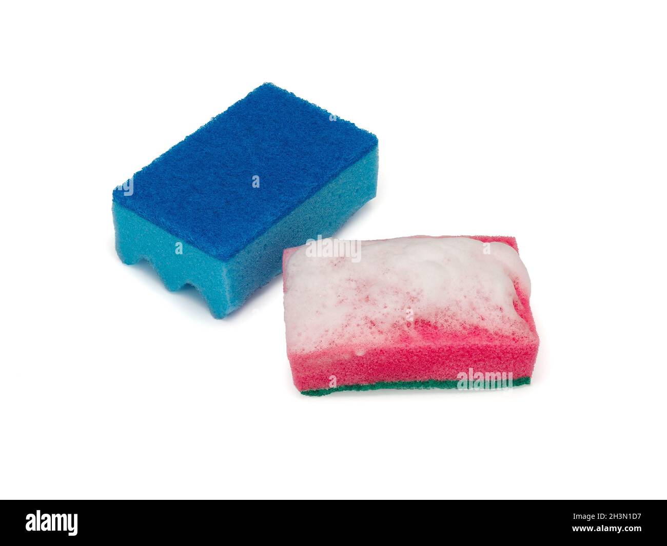 Colored sponges for washing dishes and other domestic needs. Stock Photo