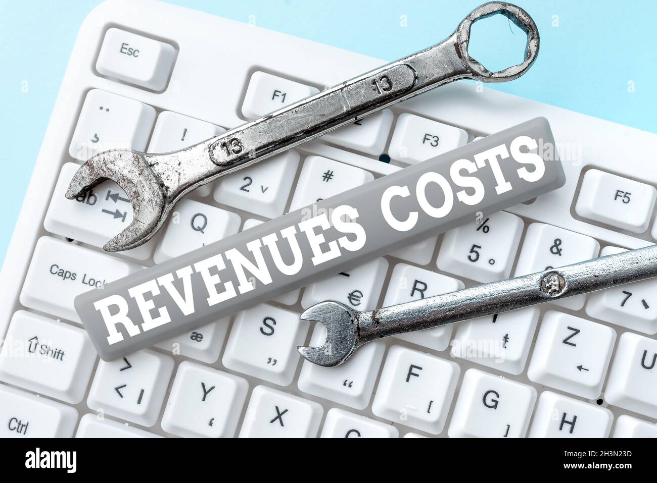 Sign displaying Revenues Costs. Concept meaning Total amount of money in Manufacturing and Delivery a product Typing Program Functional Descriptions Stock Photo