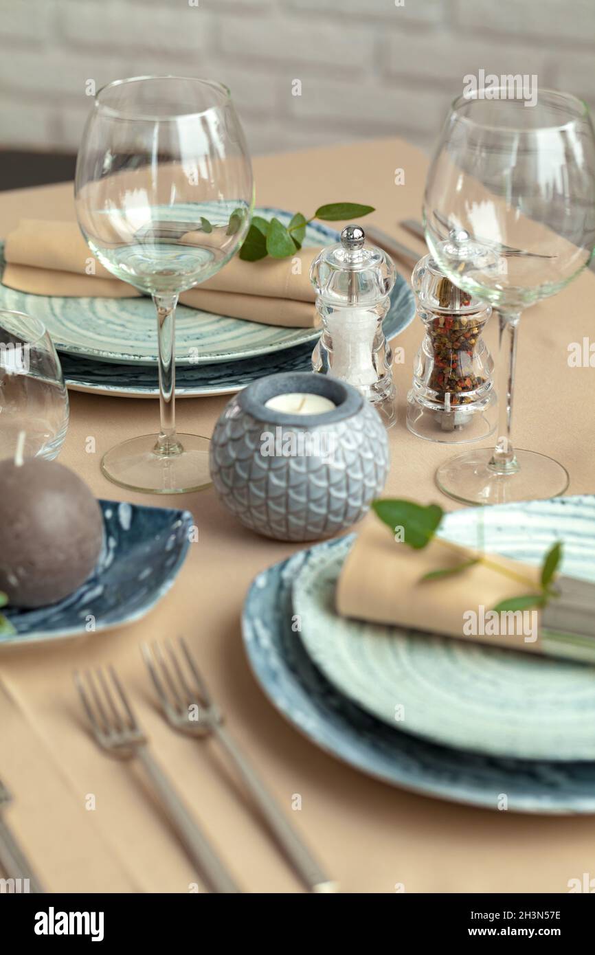 Table setting in restaurant with stylish decorations Stock Photo Alamy