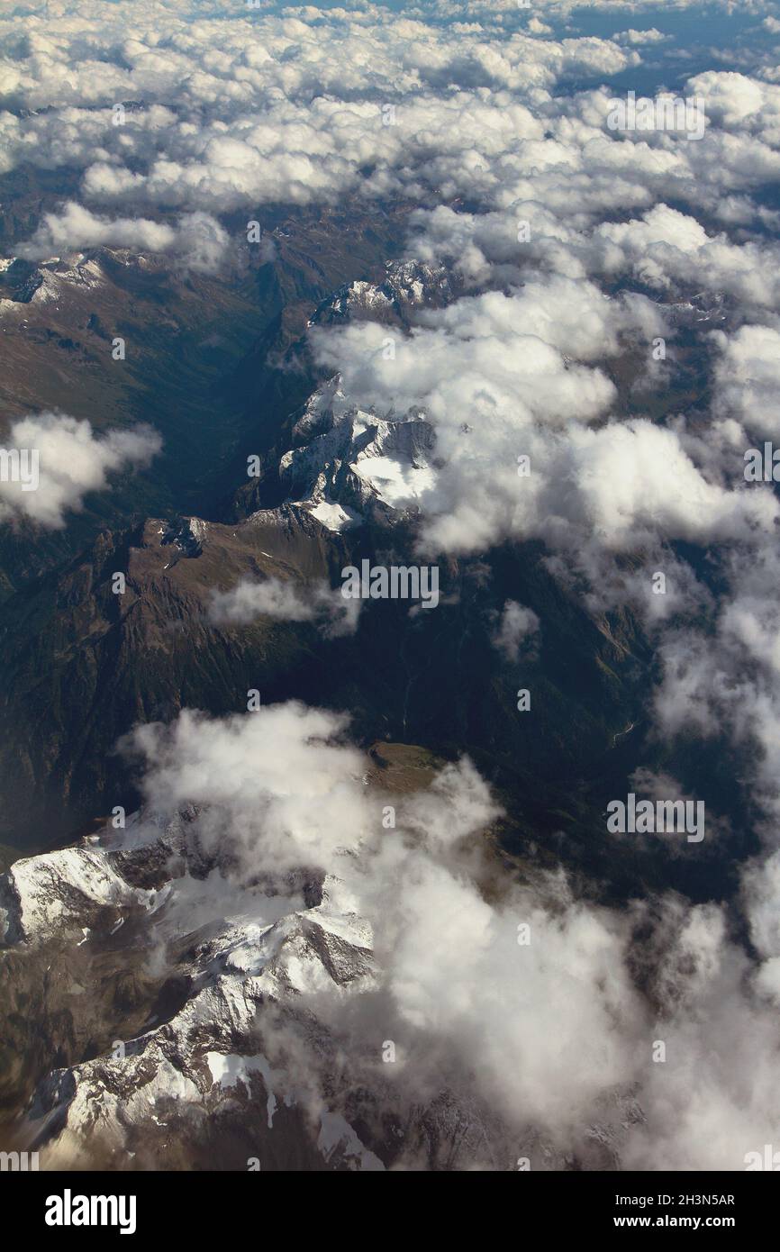 Mountain range under clouds, aerial survey. Caucasus, Krasnodar Territory, Russia Stock Photo