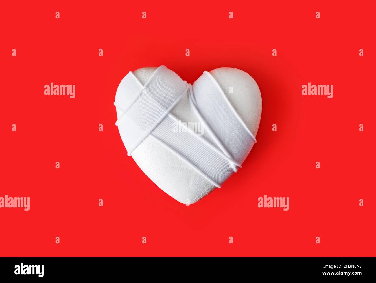 Styrofoam heart on white background Stock Photo - Alamy