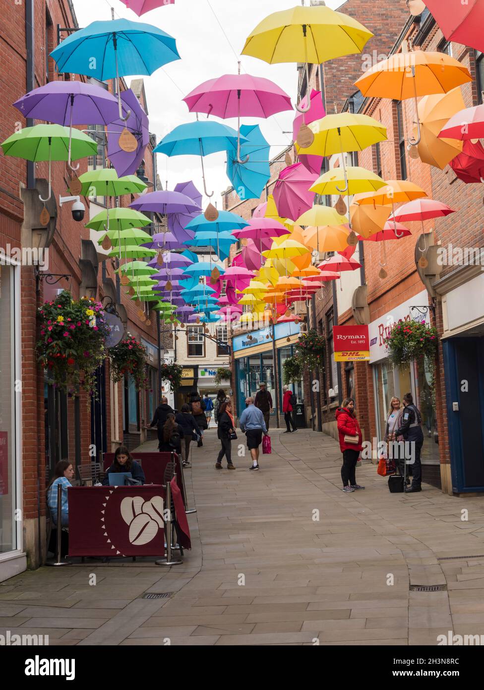 Grand display of hanging umbrellas in the umbrella street in Shopping Centre County