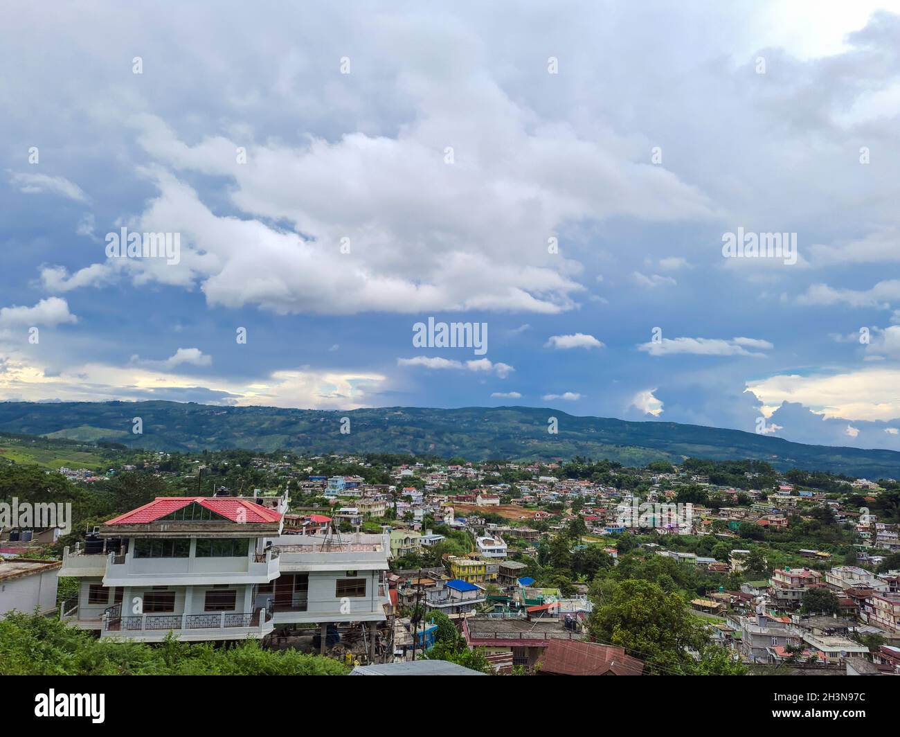 city urbanization view with mountain range at background at morning ...