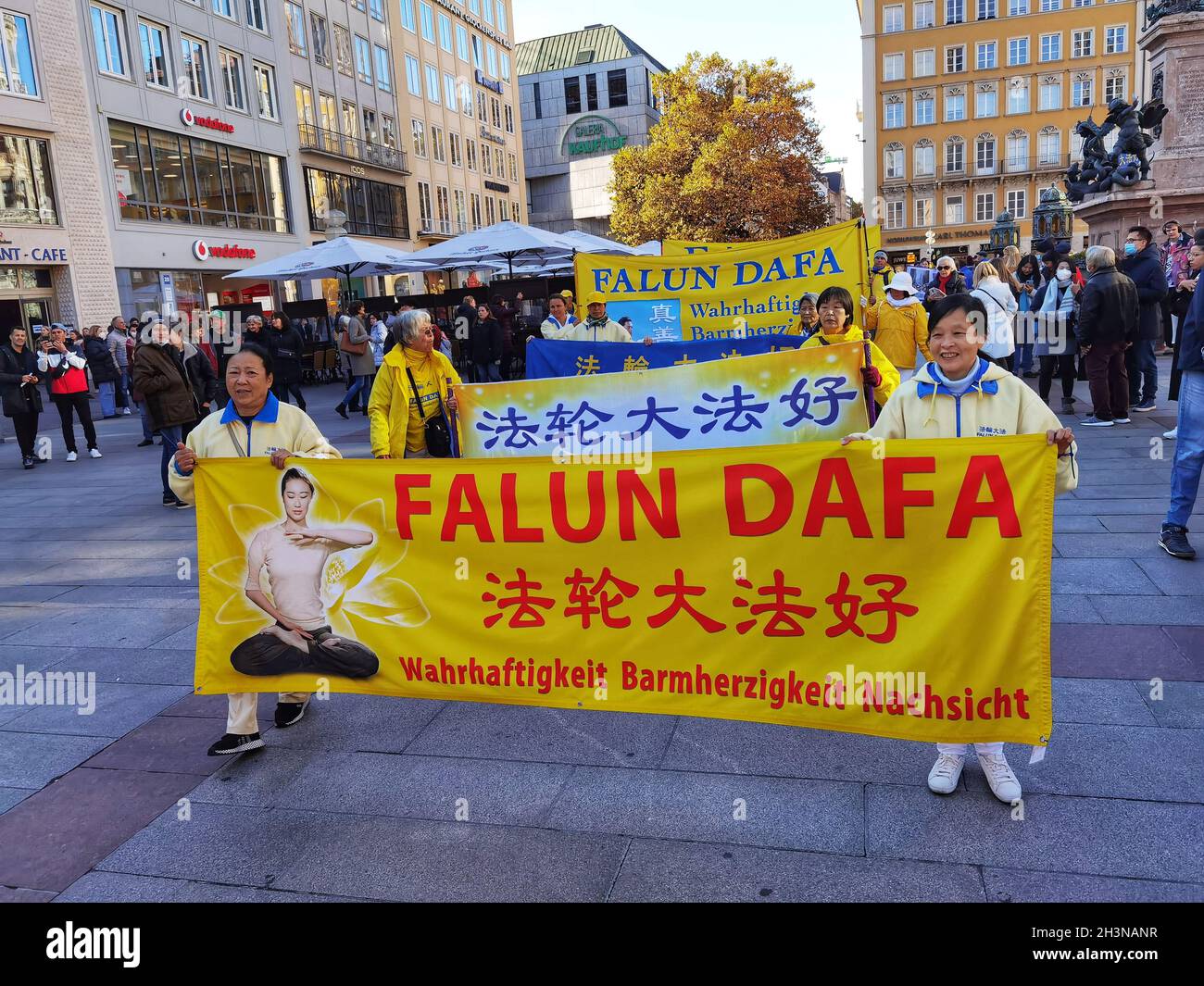 Munich, Bavaria, Germany. 29th Oct, 2021. In a display of international politics in Germany, the Falun Dafa/Falun Gong ''meditation'' group organized a large demo against the Chinese Communist Party in Munich. The Falun Gong and Dafa groups are seen around the world, particularly in the United States, as ''cults'' with the New Tang Dynasty media group as an extension of them that, while in opposition to the CCP, aligns itself with anti-democratic, conspiracy, far- and extreme-right movements in the west. Credit: ZUMA Press, Inc./Alamy Live News Stock Photo
